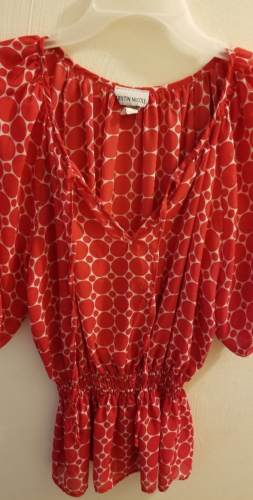 Red polka dot shirt